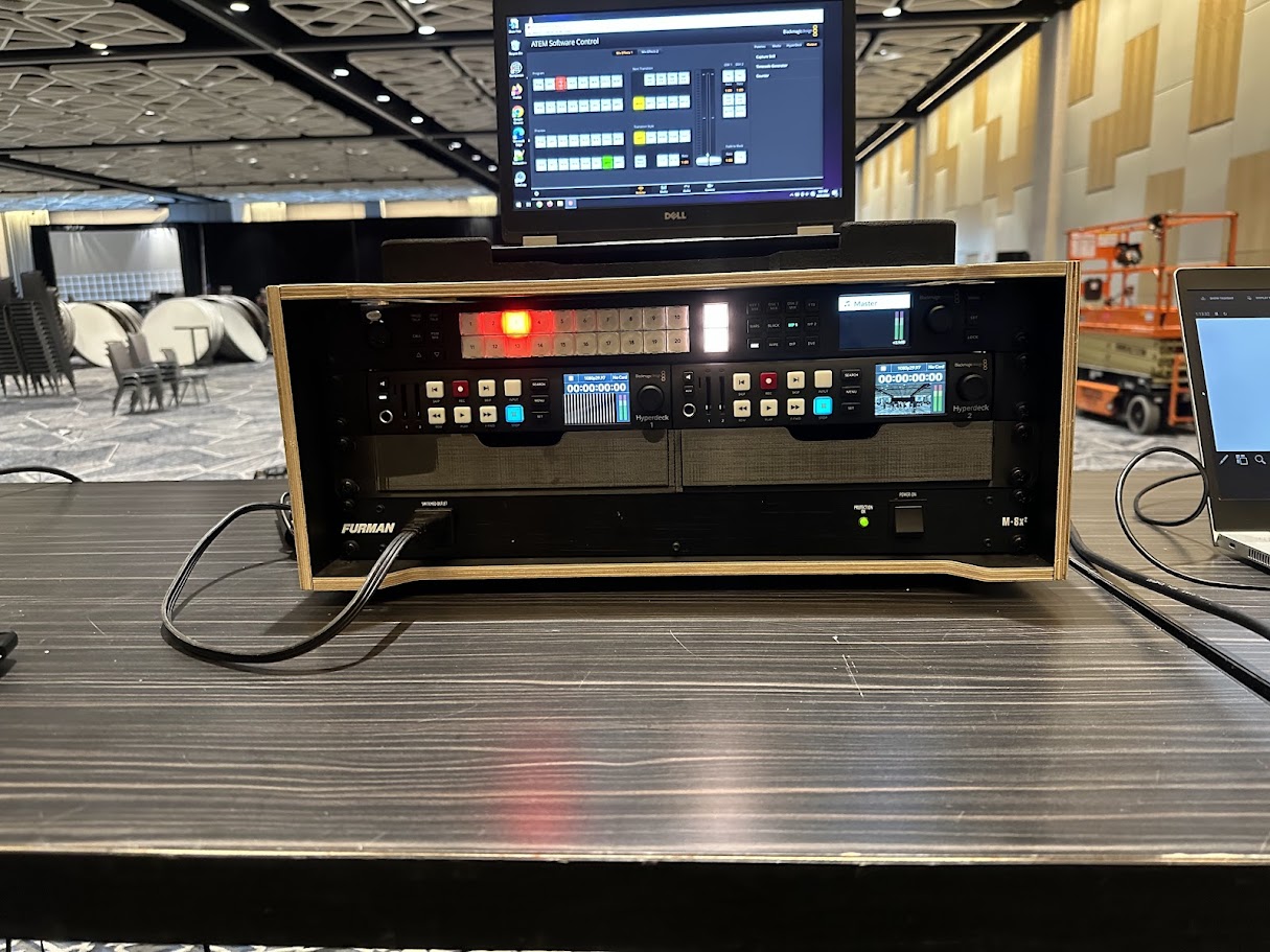 Live video switching and playback — ATEM switcher and HyperDeck recorders at a corporate ballroom
