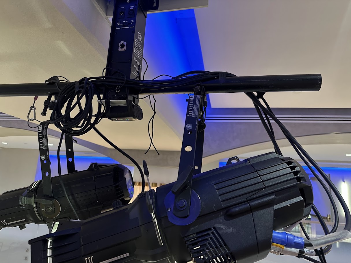 ETC Source Four LED fixtures rigged on an overhead pipe